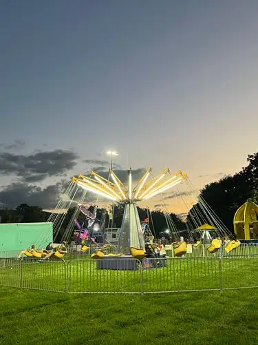 Fairground magic under a painted sky.